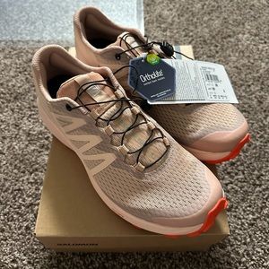 A brand new pair of hiking sneakers perfect for a summer hike!!